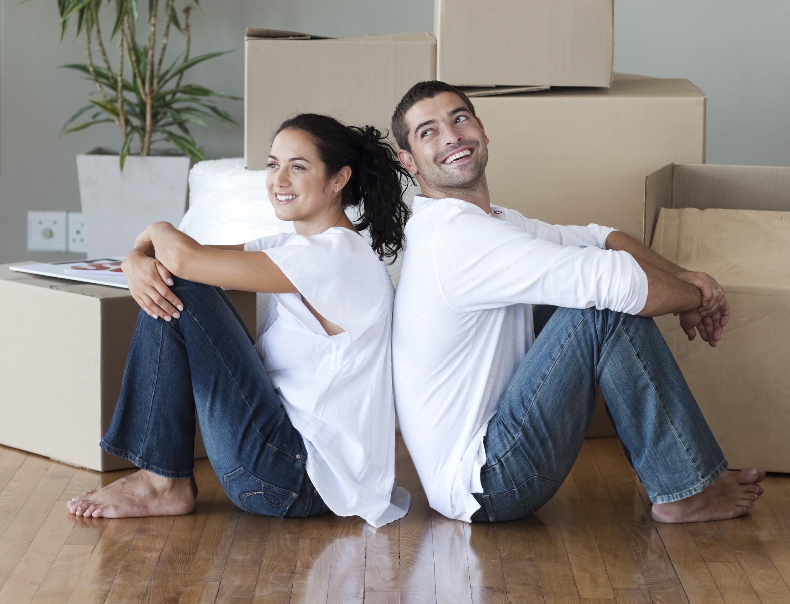 Happy Young Couple Moving House